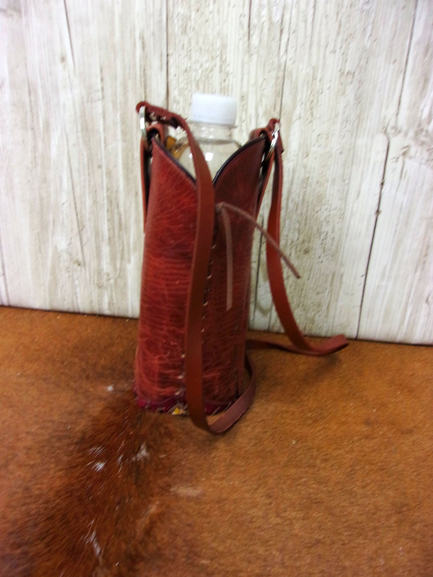 Cowboy Boot Wine Water Tote WA39 handcrafted from cowboy boots. Shop Wine Carrier Bags at ChrisThompsonBags.com and buy the best cowgirl wine tote, leather wine carrier, Leather Wine tote, recycled cowboy boots, unique gift for her, unique gift for him, water bottle caddy, water bottle holder, water bottle tote, western wine carrier, western wine tote, wine lovers gift, Wine Tote at Chris Thompson Bags.